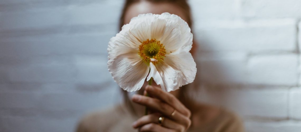 white-poppy-in-hand_4460x4460
